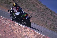 2001 open class shootout motorcycle com, Though the Kawi has the snap coming off the corners its lack of cornering clearance combined with its girth make twisties a chore