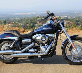 2012 harley davidson dyna super glide custom review motorcycle com, 2012 Harley Davidson Super Glide Custom is a member of the Dyna family of Harley motorcycles The SGC carries the Super Glide moniker a model name that s now 41 years old