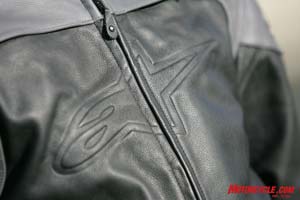 alpinestars ice leather jacket review, The pair of horizontally zippered front vents are neatly hidden in the upper chest where the gray meets the black leather
