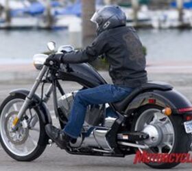 2010 honda fury review motorcycle com, A rider sits low behind the gorgeous fuel tank which helps redirect the wind at highway speeds Note the color matched aluminum swingarm that is part of the shaft drive system