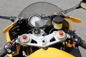 2011 kawasaki zx 10r vs 2011 bmw s1000rr shootout track motorcycle com, An analog tachometer dominates the BMW s gauge cluster while digital displays relay everything else The different power modes are adjustable via buttons on the switchgear