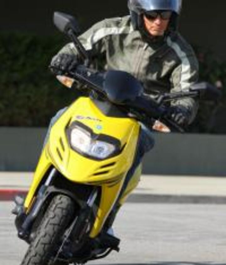 2012 piaggio typhoon 125 review motorcycle com, The Typhoon is an unassuming easy to ride scooter that takes virtually no effort to maneuver