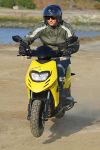 2012 piaggio typhoon 125 review motorcycle com, The Typhoon is built tough and even sports a modicum of off road pretenses too