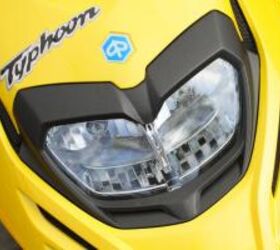 2012 piaggio typhoon 125 review motorcycle com, The standard and high beam lights shine a decent amount of light for night riding though inattentive car drivers still won t notice you