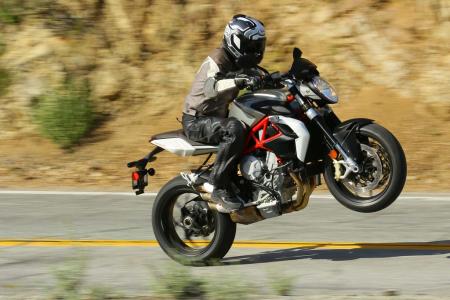 2013 mv agusta brutale 800 review motorcycle com, Wheelies happen frequently with almost 120 hp and a wheelbase 2 2 inches shorter than a Triumph Speed Triple s
