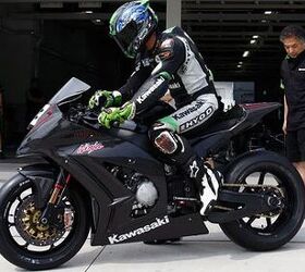 2011 kawasaki zx 10r preview motorcycle com, The left side profile shows a longer swingarm that has a beefy looking brace Note how the nose fairing stretches forward to punch a cleaner hole in the wind