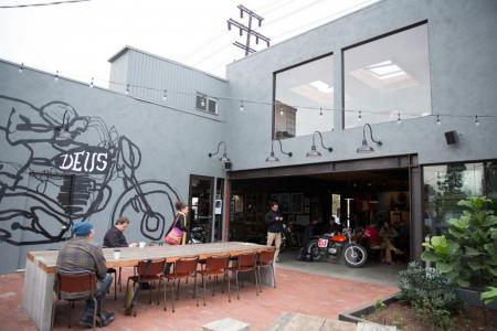 deus ex machina video, Communal tables both inside and outside are excellent spots to enjoy a coffee or pastry while ogling motorcycles