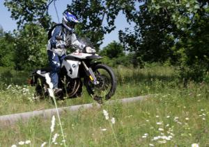 2010 bmw f800gs review motorcycle com, It wasn t long before we started hopping over smaller logs and trail junk just like we would on any other dirt bike as long as it was dry enough to get traction with the street tires