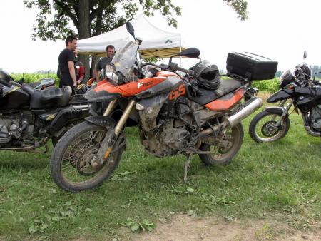 2010 bmw f800gs review motorcycle com, The optional orange colored F800GS looks like a real hot rod especially when it s covered with a nice layer of mud