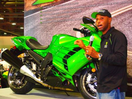 2011 progressive international motorcycle show at long beach video, Multi time drag racing champion Ricky Gadson introduced the new Kawasaki ZX 14R to the crowd and announced the Zero to Hero contest pitting four lucky contestants against Gadson for a chance to win their own ZX 14R