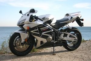 2005 cbr600rr street test motorcycle com, The new bodywork is flawless with a thinner and more aggressive looking tail section that houses a tall racer esque seat