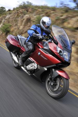 2012 bmw k1600gt review motorcycle com, A sport touring rider is coddled by many luxury and technology features yet it s surprisingly competent when presented with a twisty road This vermillion red metallic version is joined by a light grey metallic option