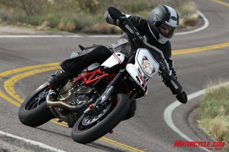 2010 ducati hypermotard 1100 evo review motorcycle com, The SP version offers quicker turn in response than the base model