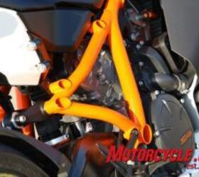 2010 ktm 1190 rc8r review motorcycle com, KTM s compact LC8 V Twin is used as a stressed member to augment the large tube chromoly steel frame