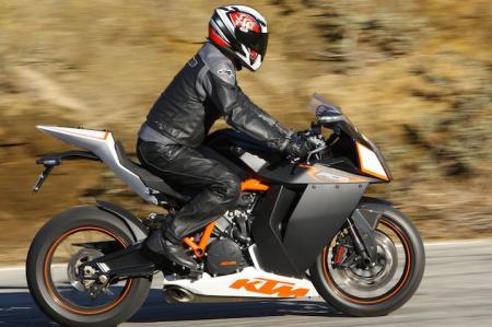 2010 ktm 1190 rc8r review motorcycle com, With handlebars in their high position and pegs low the RC8R has a surprisingly accommodating riding position
