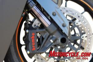 2010 ktm 1190 rc8r review motorcycle com, Lots of good stuff seen here including Brembo radial mount monoblock calipers a high end WP fork with anti stiction coating and lightweight forged aluminum wheels