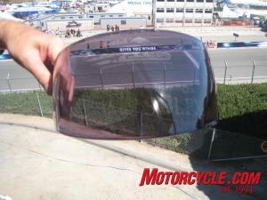 2010 red bull u s grand prix at laguna seca event report, The new Transitions faceshield from Bell automatically darkens to a smoke tint when exposed to UV rays