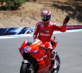 2010 red bull u s grand prix at laguna seca event report, Nicky Hayden waves to the crowd in the Corkscrew at the end of the race Despite no podium placing for Hayden his sixth place finish in the 2010 Laguna Seca MotoGP was respectable American fans seemed to approve of his efforts