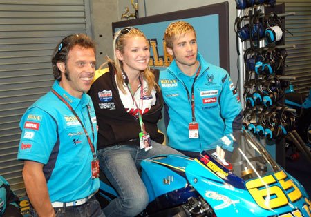 featured motorcycle brands, Elena Myers flanked by Loris Capirossi left and Alvaro Bautista right got to sit in the saddle of Capirossi s Suzuki GSV R at Laguna Seca