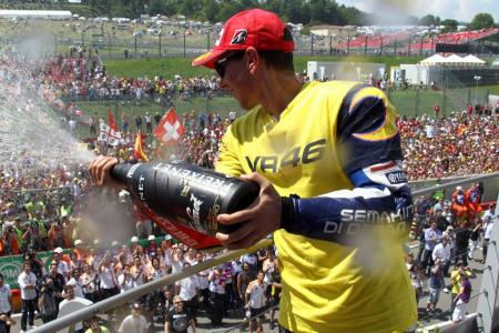 motogp 2010 mugello results, Jorge Lorenzo showed his support for Valentino Rossi by wearing a VR46 shirt on the podium
