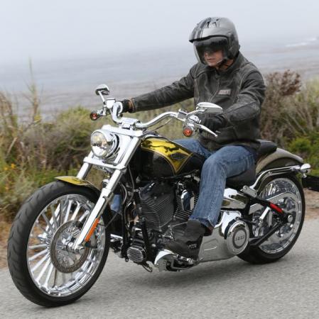 2013 harley davidson cvo breakout review motorcycle com, The feet forward riding position is supplemented by lower back support provided by the shape of the integrated rider and pillion seats