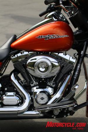 2011 bagger cruiser shootout motorcycle com, The optional Twin Cam 103 in the Harley helps keep the Glide competitive in the group The rubber mounted mill vibrates like a paint shaker at idle but once under way is remarkably smooth And it looks like a polished gem
