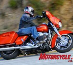 2011 bagger cruiser shootout motorcycle com, Aggressive for a cruiser steering geometry decent lean angle clearance and overall solid handling make hustling the Street Glide through twisty roads a treat