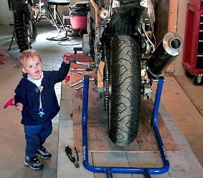 how to change your motorcycle tires motorcycle com, A little help will come in handy the first time you change your own tires
