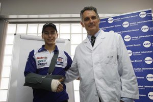 motogp leader goes under the knife, Jorge Lorenzo wears a sling following arm surgery by Dr Xavier Mir