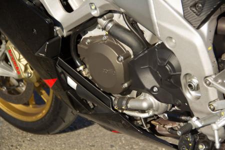 2012 aprilia rsv4 factory aprc track review motorcycle com, The same basic 65 degree 999cc V Four engine is shared between the Factory and R models but the former benefits from adjustable intake stacks and magnesium covers to increase power and shave weight