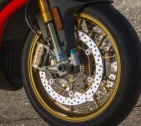 2012 aprilia rsv4 factory aprc track review motorcycle com, Forged aluminum wheels dramatically improve handling over the R model Note the Brembo monobloc calipers Ohlins fork and wheel speed sensor ring used for the APRC traction control system