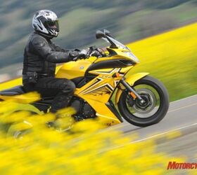2009 yamaha fz6r review motorcycle com, Emerging as an all new model for Yamaha the FZ6R bursts onto the scene in four vivid colors and graphics packages Here you see the yellow stunter edition Rumor has it the yellow bikes have more horsepower