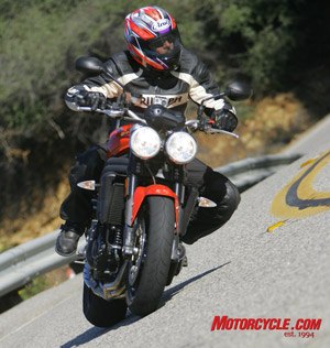 manufacturer 2009 streetfighters shootout aprilia tuono 1000 r buell 1125cr triumph , The Speed Triple doesn