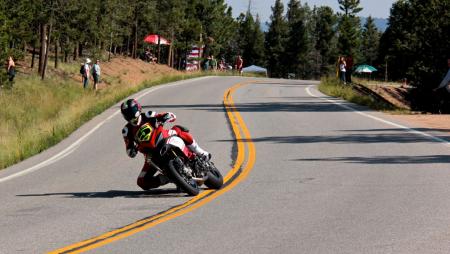 2012 pikes peak international hill climb report, Carlin Dunne eclipsed the 10 minute barrier during the 2012 Pike s Peak International Hill Climb bagging the third consecutive victory for Ducati s Multistrada