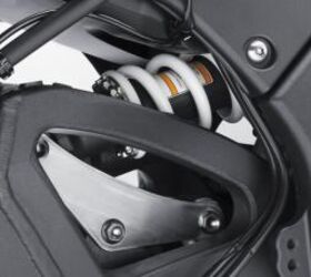 2011 kawasaki zx 10r unveiled motorcycle com, A new shock arrangement offers shelter from exhaust heat stabilizing its damping performance