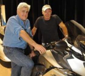 2012 bmw k1600gt and gtl six cylinder unveiled motorcycle com, Gearhead extraordinaire Jay Leno hosted the American unveiling of BMW s K1600GTL at his splendid facility Legendary actor Harrison Ford rode his BMW F800GS in the rain to check it out