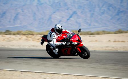 ninjapalooza motorcycle com, Compared to the other Ninjas at Chuckwalla the ZX 10R is mind numblingly fast It tears your arms out of their sockets accelerating out of a turn before nearly pitching you over the windscreen when slowing for the next rapidly approaching corner