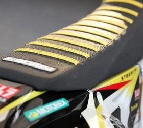 inside the 2013 supercross works bikes, James Stewart prefers to have his seat made with a bunch of little raised areas with heavy duty stitching It