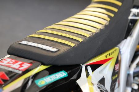 inside the 2013 supercross works bikes, James Stewart prefers to have his seat made with a bunch of little raised areas with heavy duty stitching It