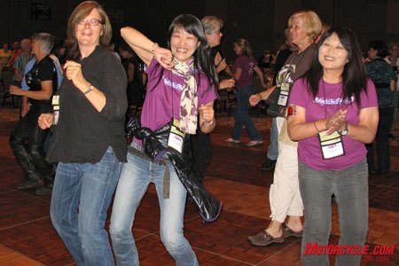 2009 ama international women and motorcycling conference, Dancing fool Jody Waltemeyer from Denver hosted eight members from the Japanese contingent of the Women s International Motorcycle Association The WIMA delegates raved that the Conference was the best women s event they d ever attended