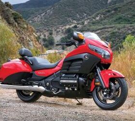six new 2013 honda models announced for us motorcycle com, The Deluxe comes equipped with an assortment of Honda accessories Both models are available in the two color options Black or Red and will be available in February