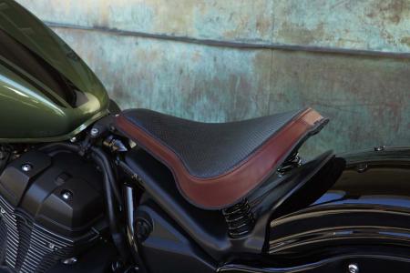 2014 star motorcycles bolt preview motorcycle com, The accessory springer seat is attractive and comfortable although the plastic cover beneath it is an eyesore Other accessories include a mini fairing brass speedo visor passenger seat and backrest tall bars and leather saddlebags