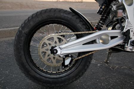 dual sport shootout electric vs gasoline motorcycle com, The Zero s chain can strike the alloy swingarm on bumps