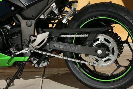 2013 kawasaki ninja 300 review motorcycle com, Rear wheel width grows 0 5 inch to 4 inches accommodating a 140 70 17 tire out back Rear sprocket loses three teeth compared to last year but overall chain length remains the same Wheelbase has also grown 5mm to 55 3 inches