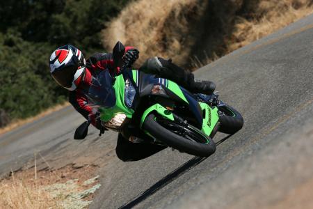 2013 kawasaki ninja 300 review motorcycle com, Coming in at well under 400 lbs the upright handlebars provide decent leverage to throw the bike from side to side The performance from the IRC tires is impressive as well