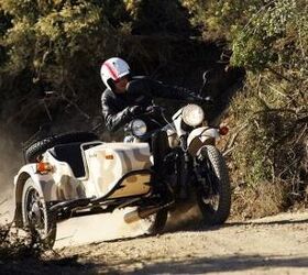 2011 ural gear up sidecar review video motorcycle com, Leaning to keep the sidecar planted is necessary during aggressive riding maneuvers but the poorly shaped angle of the handlebars is not conducive to comfortably performing this action