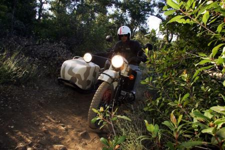 2011 ural gear up sidecar review video motorcycle com, It s wider than a normal two wheeler but the Ural can still squeeze into tight trails or blaze new ones with the help of its 2WD