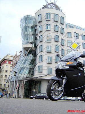 go east part 2, Frank Gehry s Dancing House might be wild but is a perfect match to Prague s ornate style The Teutonic and serious Beemer on the other hand wasn t so amused by the sight