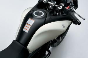 2012 suzuki v strom 650 abs preview motorcycle com, A slimmer fuel tank combined with the new side vents give the 2012 V Strom 650 a narrower shape than the previous version