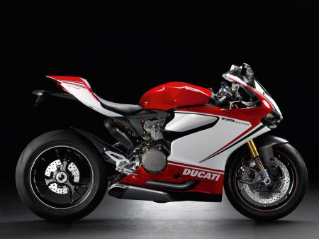 2012 ducati 1199 panigale review video motorcycle com, Top of the Panigale range is the Tricolore version that includes ABS Termignoni mufflers and a GPS equipped DDA data acquisition unit that automatically logs lap times and draws circuit maps